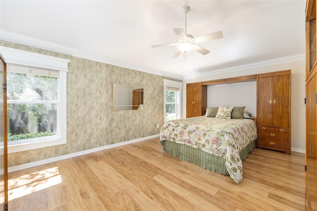 7243 SE 172nd Legacy Ln, The Villages, FL 32162 - bedroom with light wood-style floors, multiple windows, crown molding, and a ceiling fan