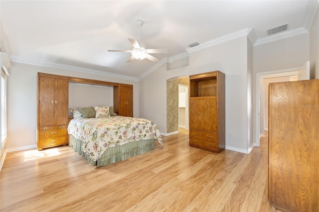 7243 SE 172nd Legacy Ln, The Villages, FL 32162 - bedroom with light wood finished floors, ornamental molding, ceiling fan, and lofted ceiling