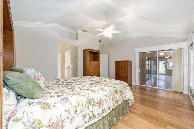 7243 SE 172nd Legacy Ln, The Villages, FL 32162 - bedroom featuring vaulted ceiling, light wood finished floors, crown molding, and a ceiling fan