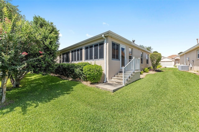 7243 SE 172nd Legacy Ln, The Villages, FL 32162 - back of house with a yard