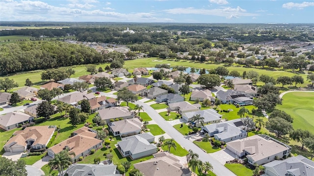 7243 SE 172nd Legacy Ln, The Villages, FL 32162 - aerial view of property's location with a golf course and nearby suburban area