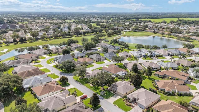 7243 SE 172nd Legacy Ln, The Villages, FL 32162 - aerial view of property's location featuring a large body of water and nearby suburban area