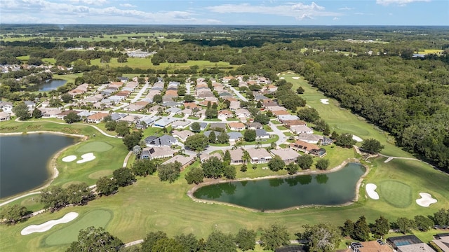 7243 SE 172nd Legacy Ln, The Villages, FL 32162 - aerial overview of property's location with a nearby body of water and nearby suburban area