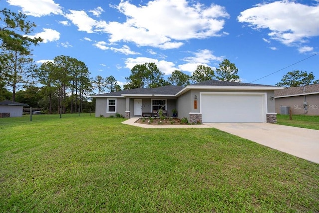 13479 SW 100th Ln, Dunnellon, FL 34432 - single story home featuring stucco siding, driveway, a garage, and a front lawn