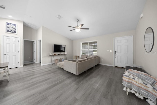 13479 SW 100th Ln, Dunnellon, FL 34432 - living area with lofted ceiling, a ceiling fan, and wood finished floors