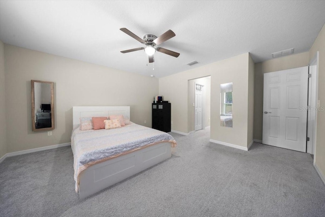 13479 SW 100th Ln, Dunnellon, FL 34432 - bedroom featuring light carpet and ceiling fan