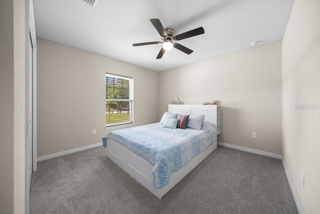 13479 SW 100th Ln, Dunnellon, FL 34432 - carpeted bedroom featuring baseboards and a ceiling fan