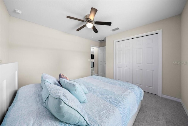 13479 SW 100th Ln, Dunnellon, FL 34432 - bedroom with carpet flooring, a closet, and ceiling fan