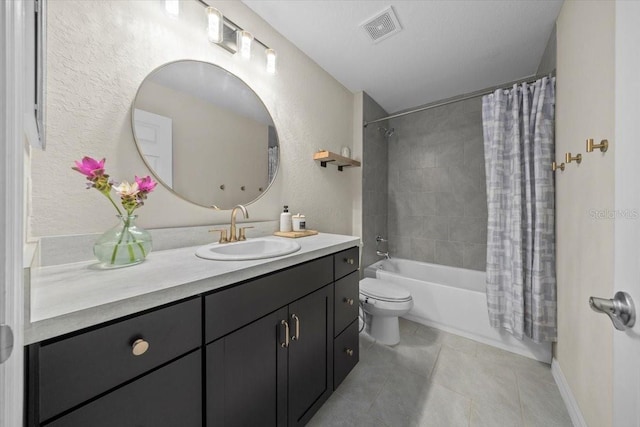13479 SW 100th Ln, Dunnellon, FL 34432 - bathroom featuring vanity, tile patterned floors, shower / tub combo, and a textured wall