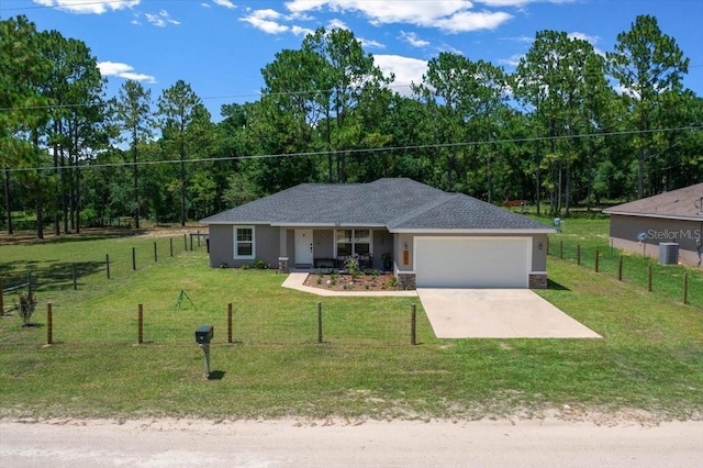 13479 SW 100th Ln, Dunnellon, FL 34432 - single story home featuring an attached garage, driveway, stucco siding, and a porch