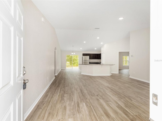 5 Water Pass, Ocala, FL 34472 - unfurnished living room featuring healthy amount of natural light, light wood finished floors, and recessed lighting