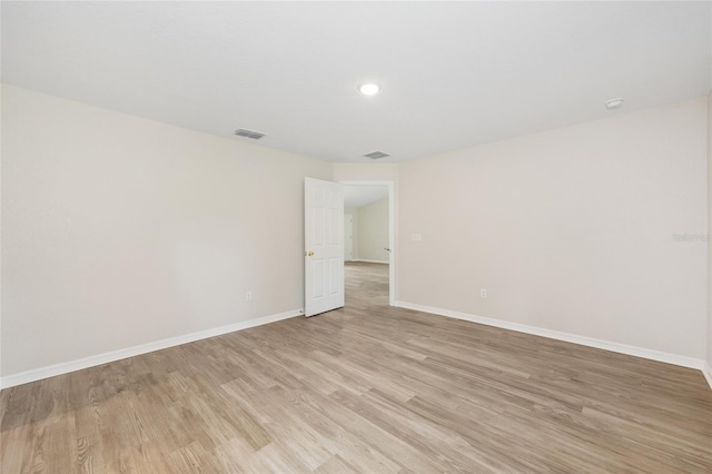 5 Water Pass, Ocala, FL 34472 - empty room featuring light wood-style flooring, a smoke detector, and recessed lighting