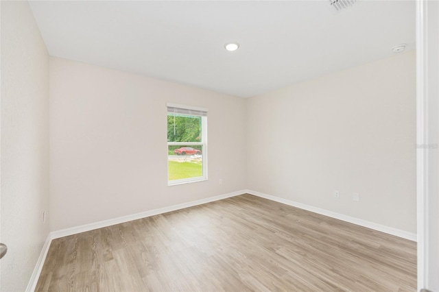 5 Water Pass, Ocala, FL 34472 - empty room featuring light wood-style floors and a smoke detector