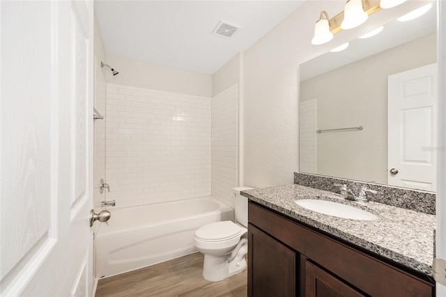5 Water Pass, Ocala, FL 34472 - bathroom featuring vanity, wood finished floors, and bathtub / shower combination