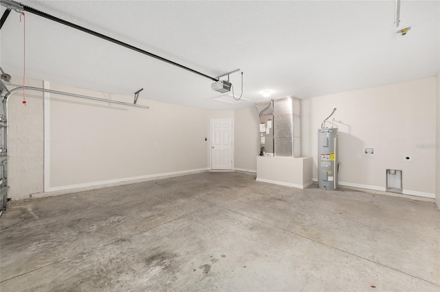 5 Water Pass, Ocala, FL 34472 - garage featuring water heater, a garage door opener, and heating unit