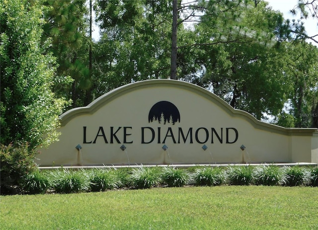 80 Hickory Course Loop, Ocala, FL 34472 - community sign with a yard