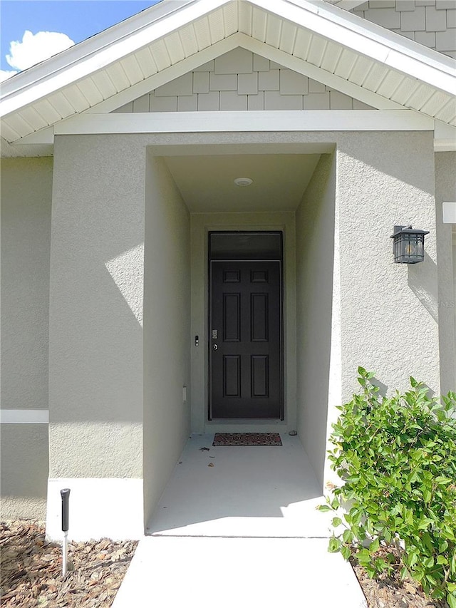 80 Hickory Course Loop, Ocala, FL 34472 - entrance to property featuring stucco siding