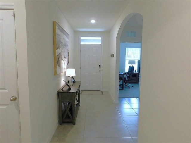 80 Hickory Course Loop, Ocala, FL 34472 - entrance foyer featuring arched walkways and light tile patterned floors