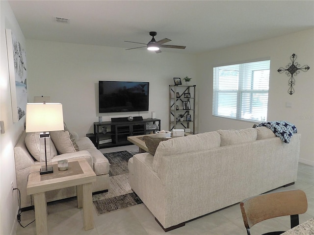 80 Hickory Course Loop, Ocala, FL 34472 - living room featuring ceiling fan and light tile patterned flooring