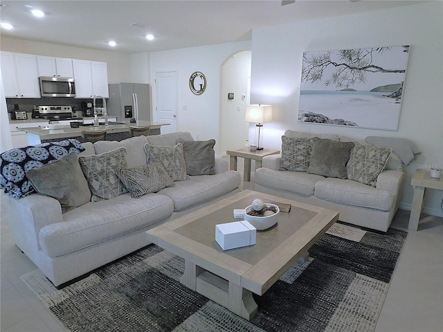 80 Hickory Course Loop, Ocala, FL 34472 - living area featuring arched walkways and recessed lighting