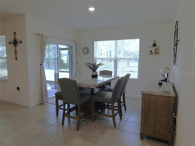80 Hickory Course Loop, Ocala, FL 34472 - dining room with light tile patterned flooring and recessed lighting