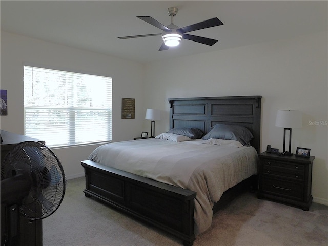 80 Hickory Course Loop, Ocala, FL 34472 - bedroom featuring light colored carpet and ceiling fan