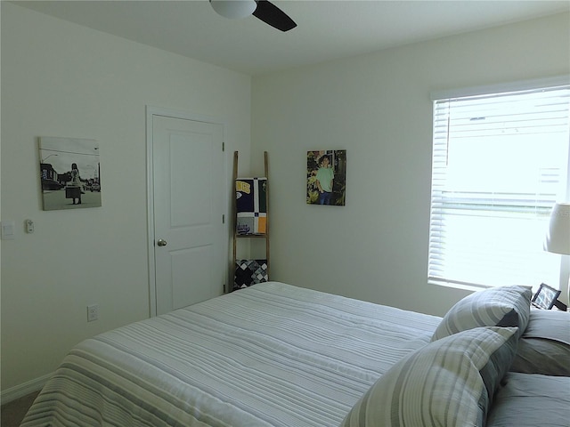 80 Hickory Course Loop, Ocala, FL 34472 - bedroom with multiple windows and a ceiling fan