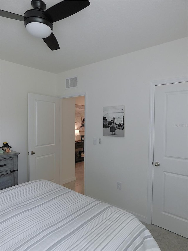 80 Hickory Course Loop, Ocala, FL 34472 - bedroom featuring ceiling fan and light carpet