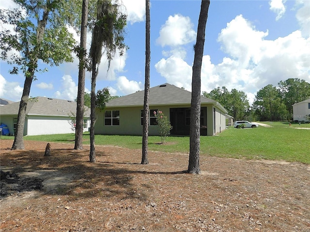 80 Hickory Course Loop, Ocala, FL 34472 - view of front of property with a front yard and stucco siding