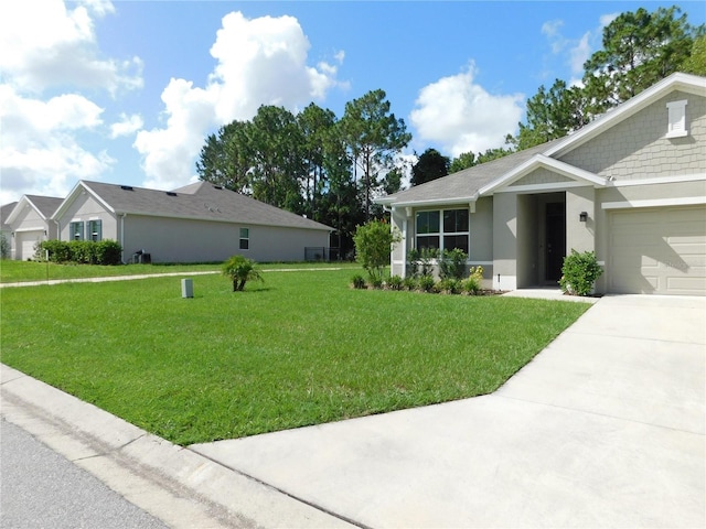 80 Hickory Course Loop, Ocala, FL 34472 - view of front facade with a front lawn, a garage, stucco siding, and driveway