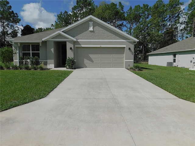 80 Hickory Course Loop, Ocala, FL 34472 - view of front of house with an attached garage, a front lawn, driveway, and stucco siding