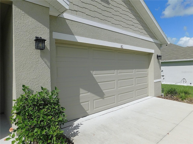 80 Hickory Course Loop, Ocala, FL 34472 - garage featuring concrete driveway