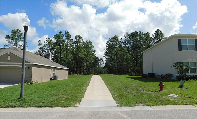 80 Hickory Course Loop, Ocala, FL 34472 - view of property's community with a yard
