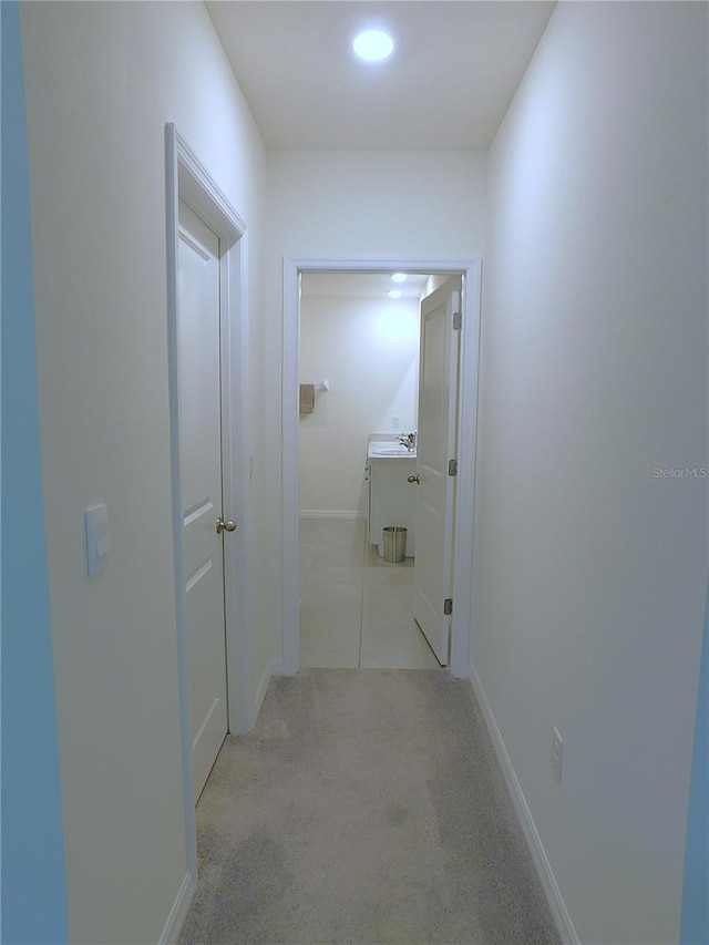 80 Hickory Course Loop, Ocala, FL 34472 - hall featuring carpet flooring and baseboards
