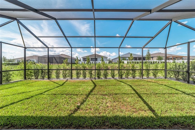 8913 SW 76th Ln, Ocala, FL 34481 - view of grassy yard with a residential view and a lanai