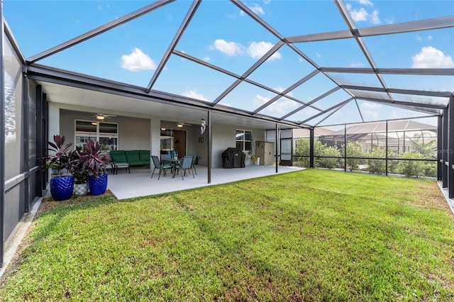 8913 SW 76th Ln, Ocala, FL 34481 - back of house with a patio area, a yard, stucco siding, and ceiling fan