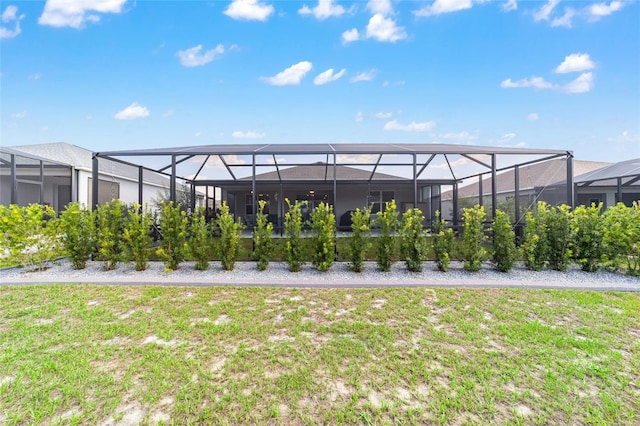 8913 SW 76th Ln, Ocala, FL 34481 - view of green lawn featuring a lanai