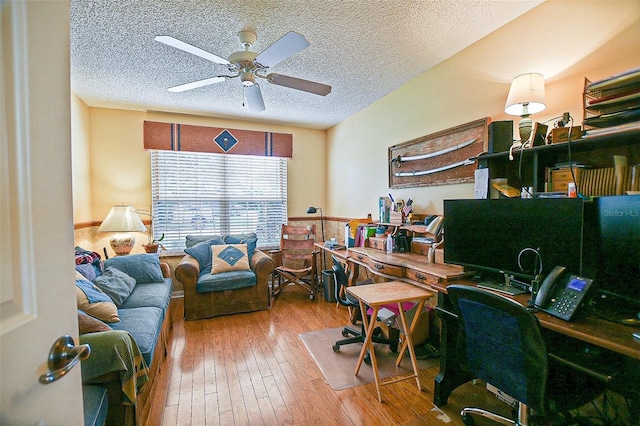 3146 Williams Rd, The Villages, FL 32162 - office with a ceiling fan, hardwood / wood-style flooring, and a textured ceiling