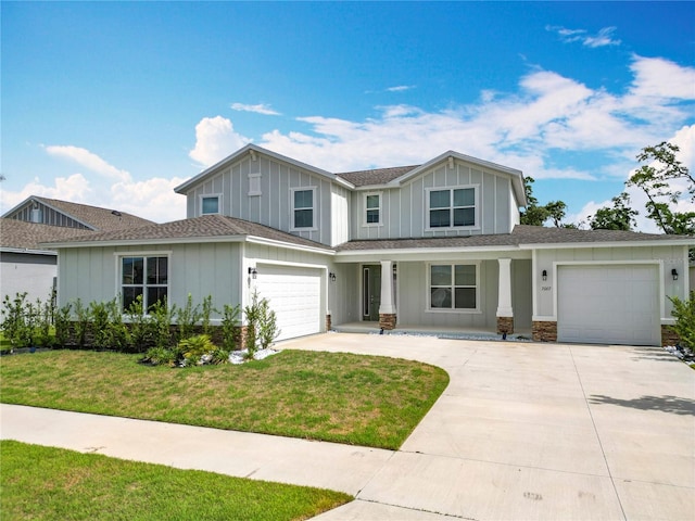 7067 SW 60th Ln, Ocala, FL 34474 - view of front of home with driveway, board and batten siding, a porch, a front yard, and a shingled roof