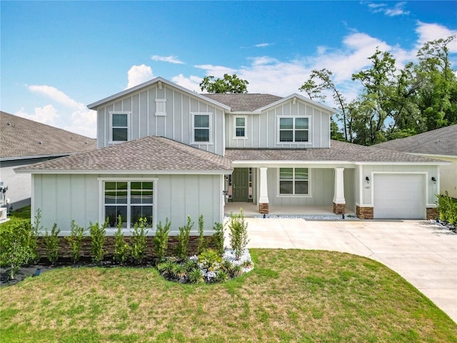 7067 SW 60th Ln, Ocala, FL 34474 - view of front of house featuring board and batten siding, an attached garage, a shingled roof, and driveway