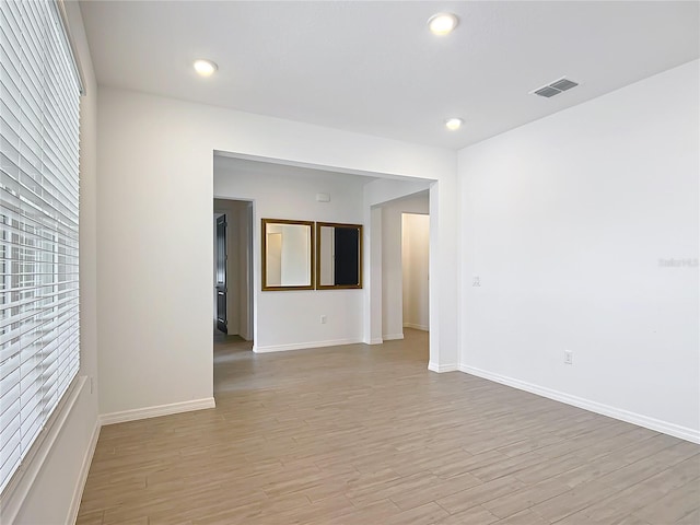 7067 SW 60th Ln, Ocala, FL 34474 - unfurnished room with light wood-style flooring and recessed lighting