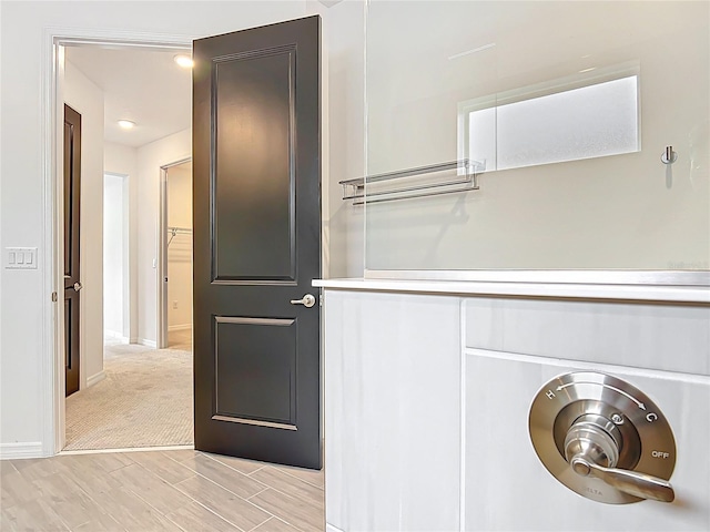 7067 SW 60th Ln, Ocala, FL 34474 - laundry room with light wood-style floors and independent washer and dryer