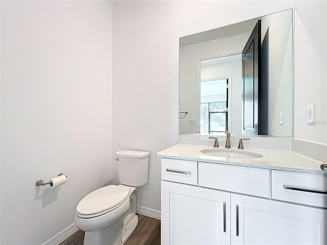 7067 SW 60th Ln, Ocala, FL 34474 - half bath featuring vanity and wood finished floors