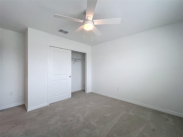 7067 SW 60th Ln, Ocala, FL 34474 - unfurnished bedroom featuring carpet floors, a closet, and ceiling fan