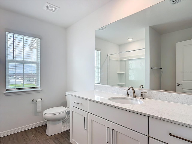 7067 SW 60th Ln, Ocala, FL 34474 - full bath featuring plenty of natural light, vanity, wood finished floors, and a shower