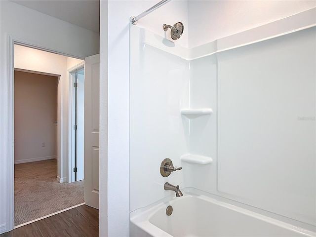7067 SW 60th Ln, Ocala, FL 34474 - bathroom featuring bathtub / shower combination and wood finished floors