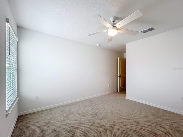 7067 SW 60th Ln, Ocala, FL 34474 - unfurnished room featuring healthy amount of natural light, light carpet, and ceiling fan