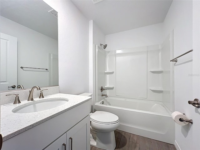 7067 SW 60th Ln, Ocala, FL 34474 - bathroom featuring vanity, wood finished floors, and bathing tub / shower combination