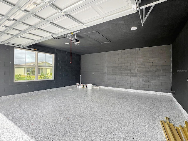 7067 SW 60th Ln, Ocala, FL 34474 - garage with concrete block wall and a garage door opener