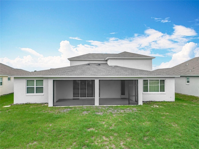 7067 SW 60th Ln, Ocala, FL 34474 - back of property with a sunroom, roof with shingles, a yard, and stucco siding